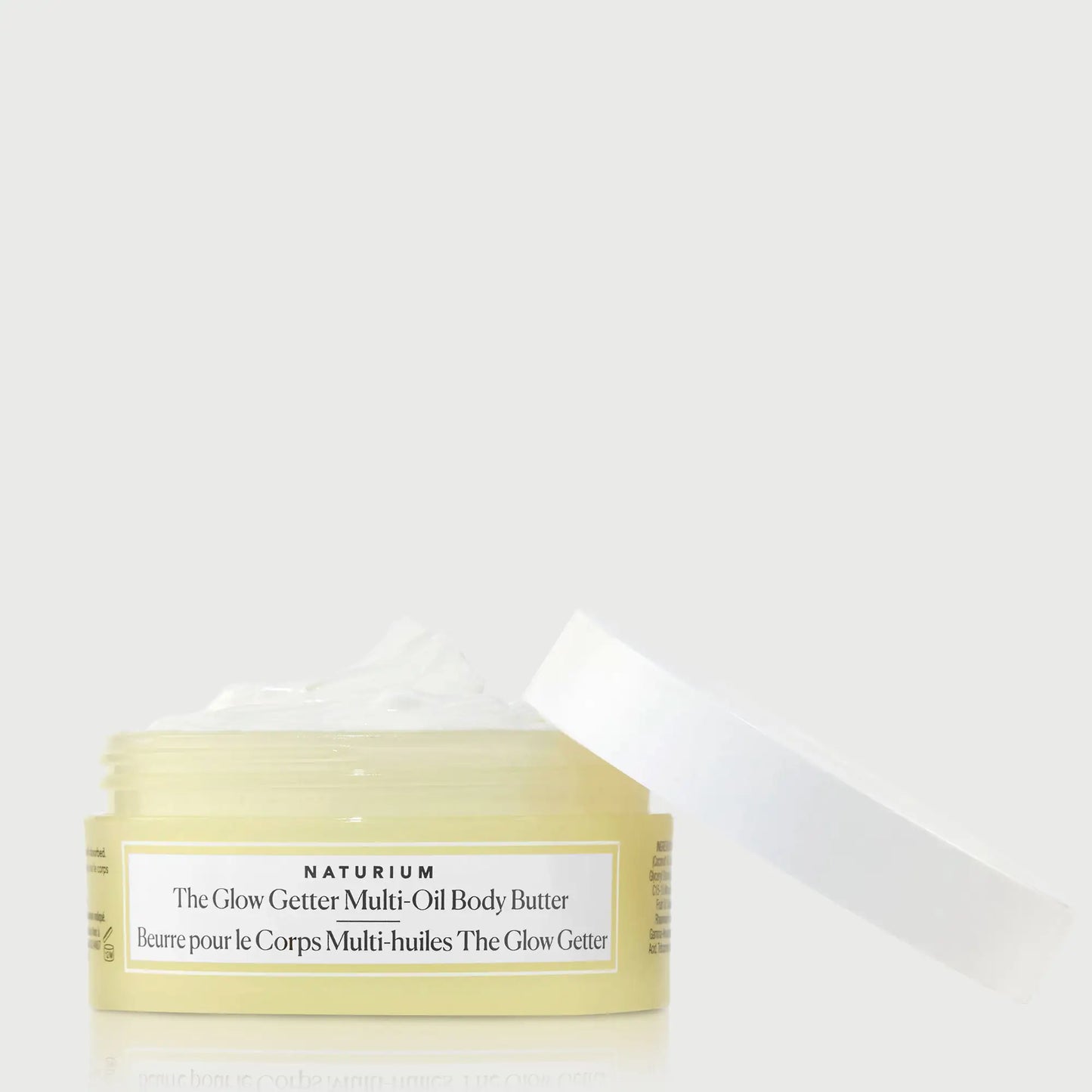 the-glow-getter-multi-oil-body-butter-travel-size-b3 NATR-40115_Glow-Getter-Body-Butter-Mini_front_capoff_bonebkgd.webp