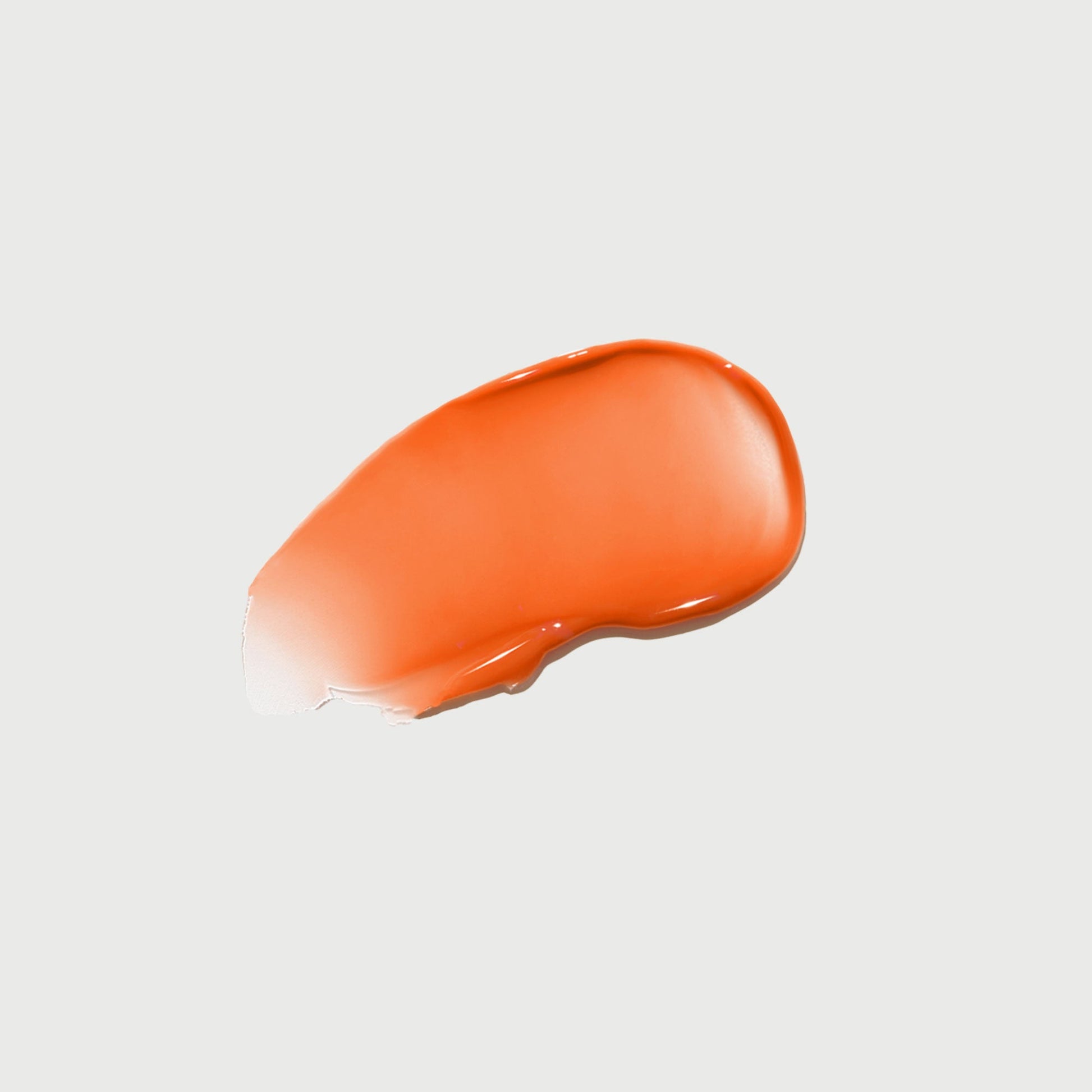 phyto-glow-lip-balm-mango-j0 NATR-10120-Swatch-Phyto-Glow-Mango-bonebkgd.jpg