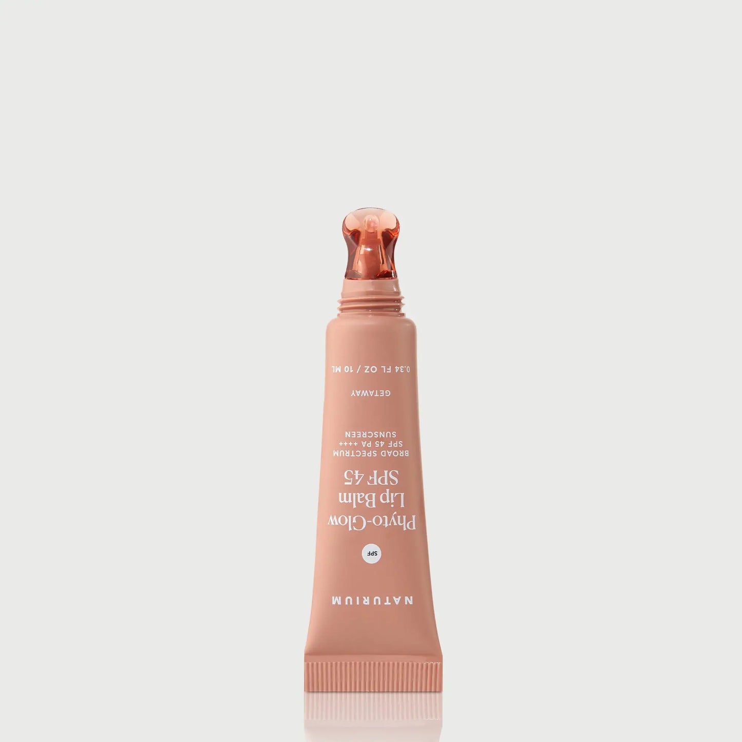 phyto-glow-lip-balm-spf-45-getaway-i7 NATR-10126_PhytoGlow_SPF_Getaway_primary_nocap_bonebkgd_1.webp
