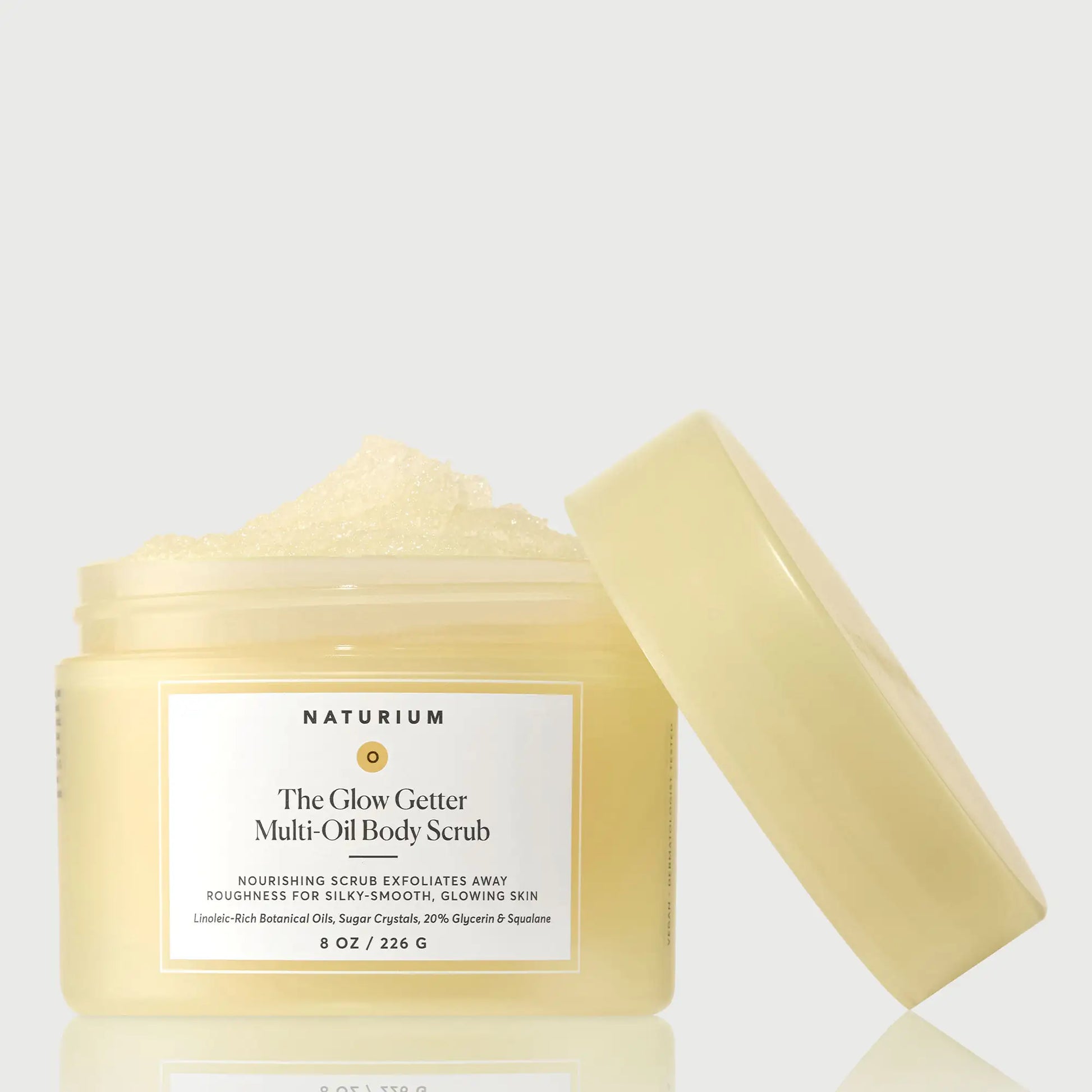 the-glow-getter-multi-oil-body-scrub-t3 NATR-40028-GlowGetter-Multi-Oil-Body-Scrub-Front-CapOff-bonebkgd.webp